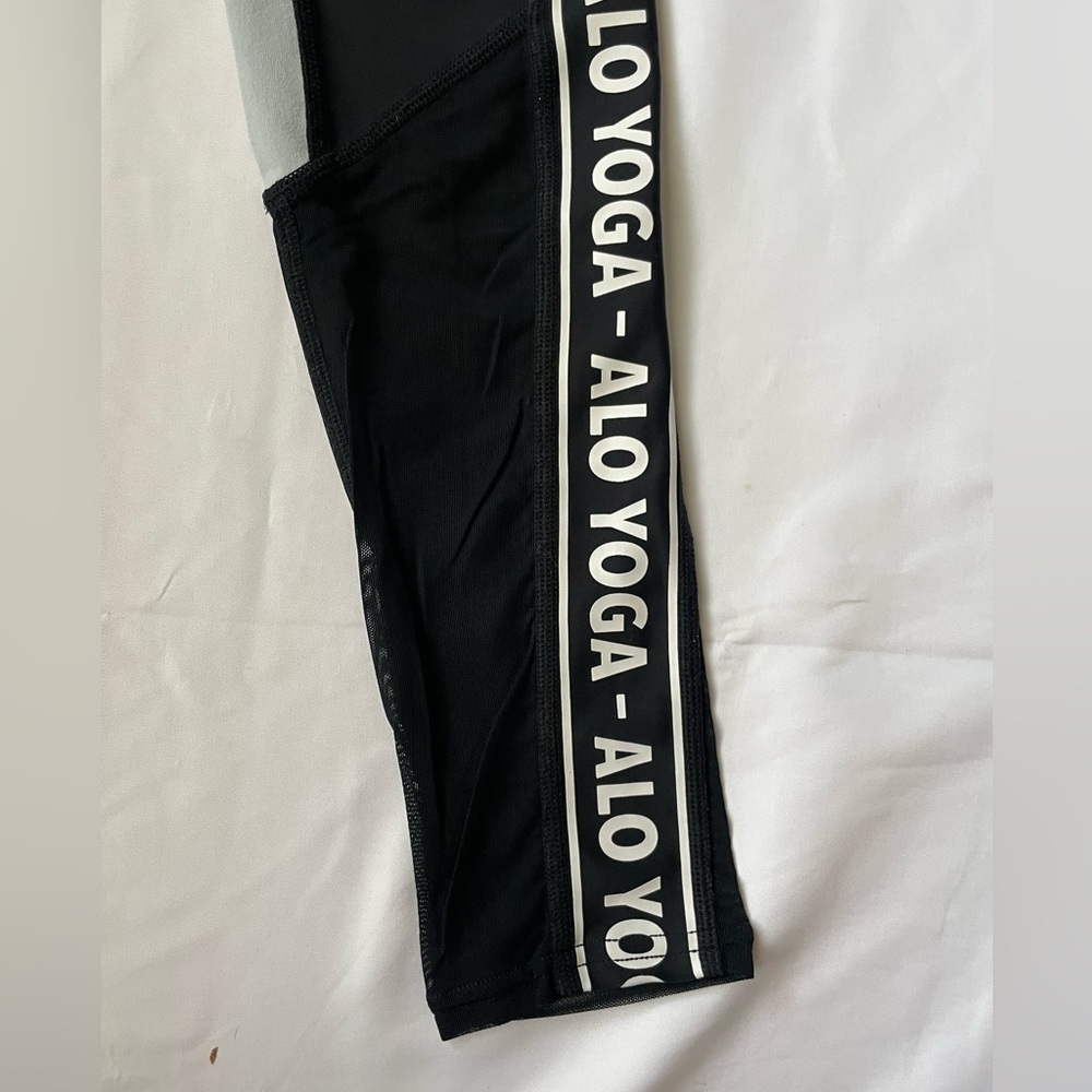 ALO Yoga High Waist Logo Black Leggings With Mesh Bottoms - Picture 2 of 10